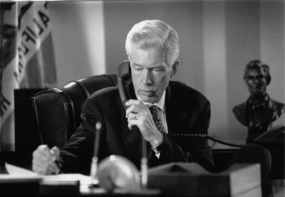 Governor Gray Davis speaking on the phone with Speaker Herb Wesson.