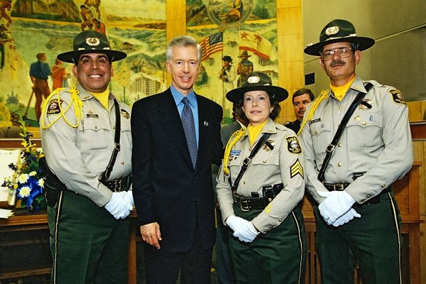 Governor Davis Joined by Officers Speaking At a Reception Honoring Fallen Officers.