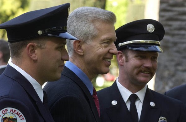 Governor Gray Davis Flanked By California Firefighters At The Unveiling of the Firefighters Memorial