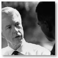 Governor Gray Davis Speaking with a local resident following a town-hall meeting in Southern California.