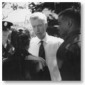 Governor Gray Davis Speaking with law enforcement officers following a Town Hall meeting.